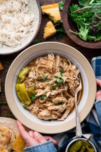 Discover tender Mississippi Chicken made easy in a slow cooker, featuring savory ranch, au jus, and pepperoncini for a delicious Southern meal