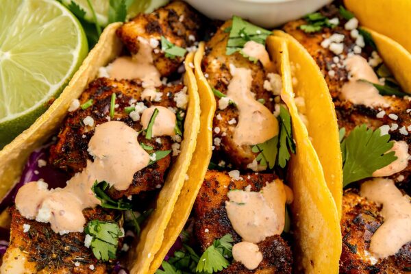 Enjoy fresh and flavorful Trout Tacos with flaked trout, vibrant cabbage slaw, avocado slices, and crumbled queso fresco, perfect for a light and healthy meal