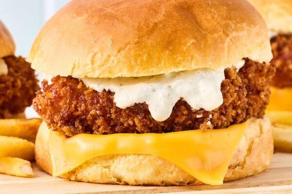 Enjoy a homemade version of the classic McDonald's Filet-o-Fish Sandwich! Crispy fish fillets, tangy tartar sauce, and soft buns make this