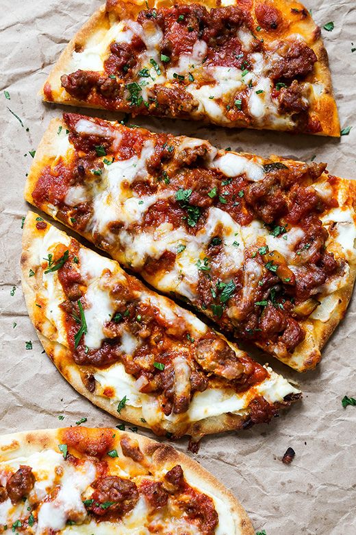 Discover a delicious twist on lasagna with this easy Lasagna Flatbread recipe, featuring layers of meat sauce and creamy cheese in warm flatbread