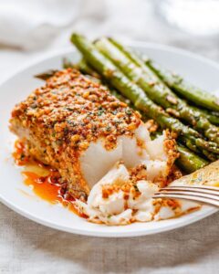 Enjoy a quick, healthy dinner with this Parmesan-Crusted Baked Fish recipe. Crispy, flavorful, and easy to make, perfect for weeknight meals or special occasions