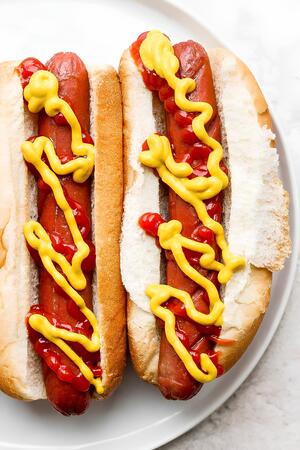 Discover how to make crispy and juicy air fryer hot dogs in under 10 minutes. Customize with your favorite toppings for a quick, delicious meal