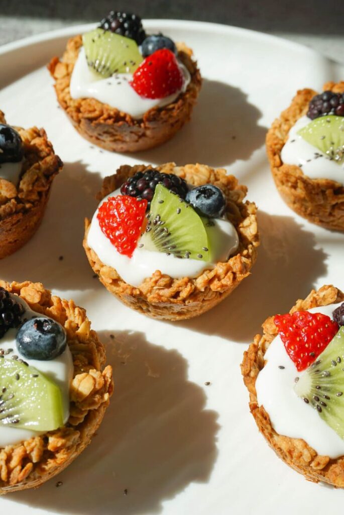 Discover how to cook delightful Granola Cups filled with yogurt and berries. Perfect for breakfast or a healthy snack, they're a tasty treat you'll love!