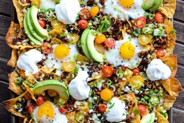 Discover how to cook delicious Breakfast Nachos with crispy chips, fluffy eggs, and fresh toppings. A fun twist to elevate your morning meals!