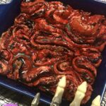 Delight your guests with spooky Zombie Guts Cinnamon Rolls! These gooey, bloody treats are perfect for Halloween parties and will leave everyone wanting more