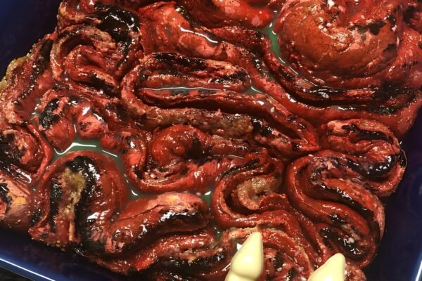 Delight your guests with spooky Zombie Guts Cinnamon Rolls! These gooey, bloody treats are perfect for Halloween parties and will leave everyone wanting more