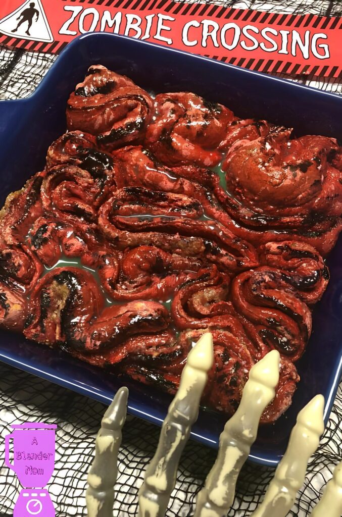 Delight your guests with spooky Zombie Guts Cinnamon Rolls! These gooey, bloody treats are perfect for Halloween parties and will leave everyone wanting more